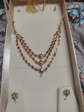 Elegant 3-step Kundan necklace with traditional layered design