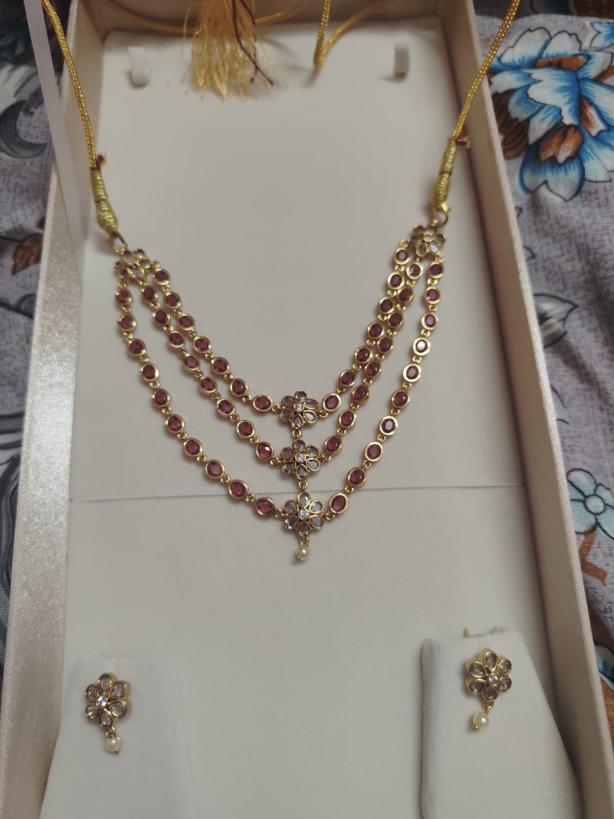 Elegant 3-step Kundan necklace with traditional layered design